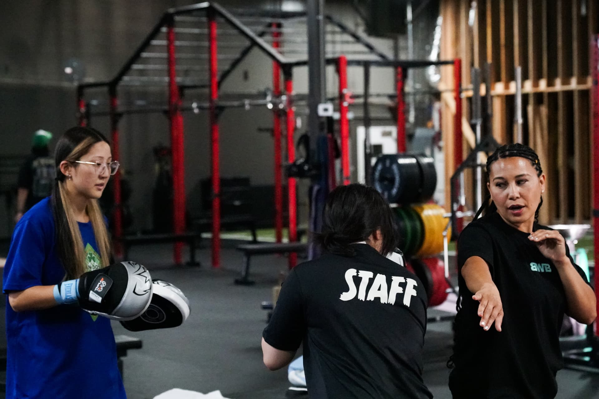 Coach Mary Ann demonstrating technique to a class
