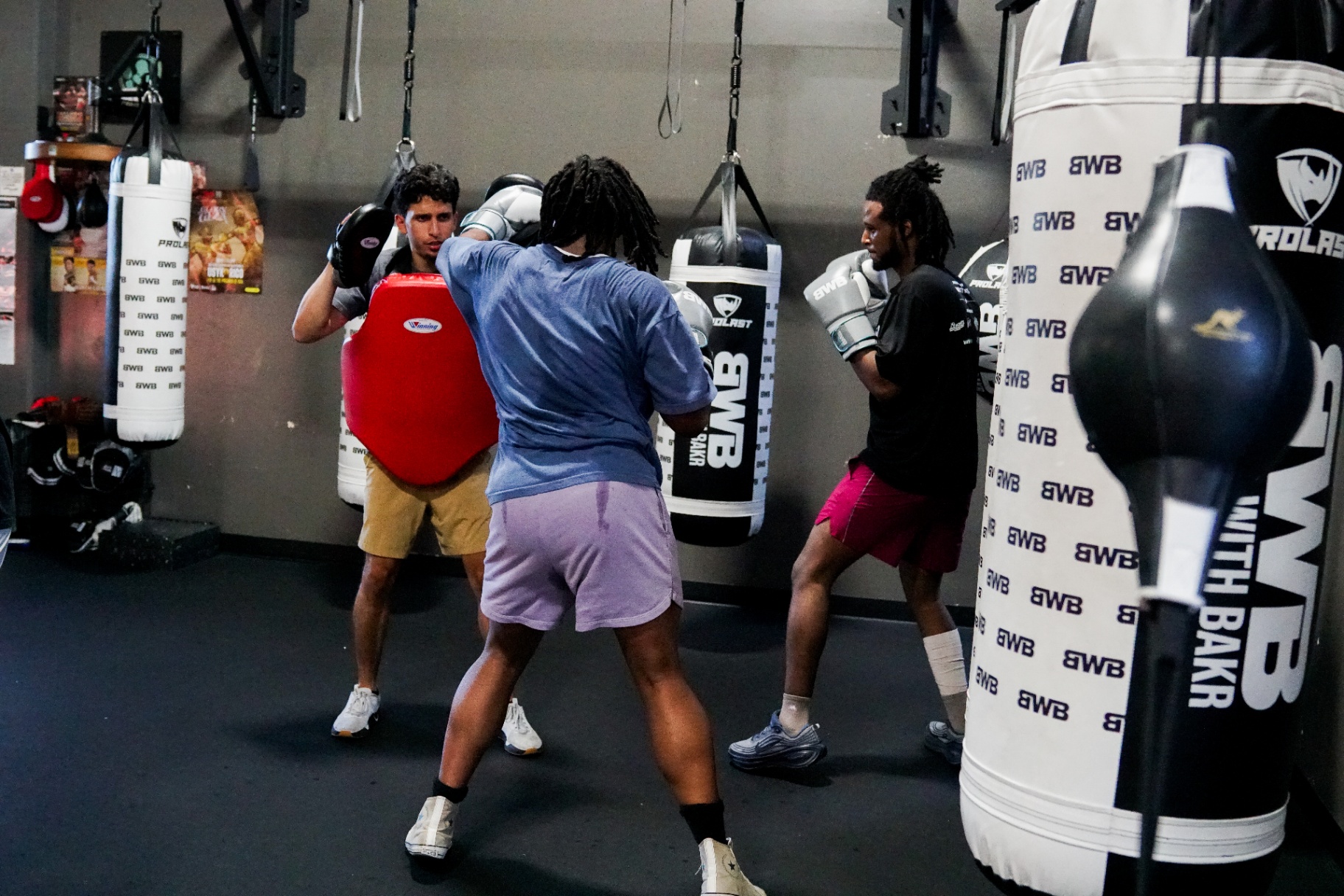 Partner pad drill during an all-levels group class at BWB