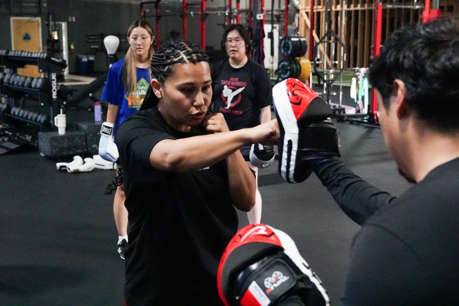 Coach Mary Ann throwing a straight right on the mitts
