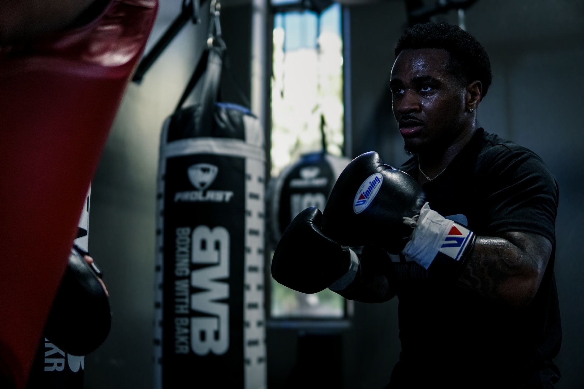 Steve in fight stance at Boxing With Bakr, gloves up